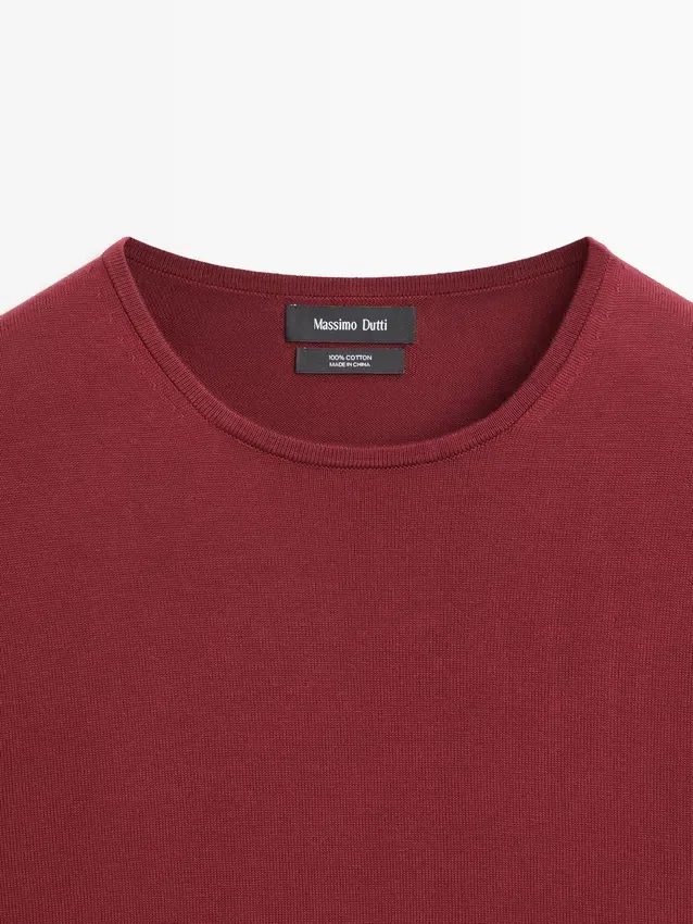 Baumwollstrickpullover mit Rundhalsausschnitt Baumwollstrickpullover mit Rundhalsausschnitt