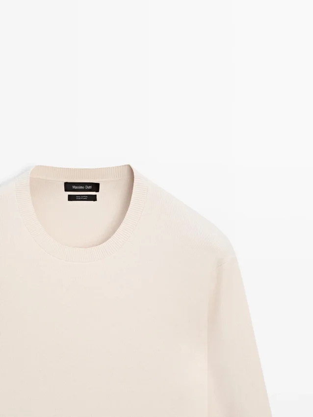 Baumwollstrickpullover mit Rundhalsausschnitt Baumwollstrickpullover mit Rundhalsausschnitt