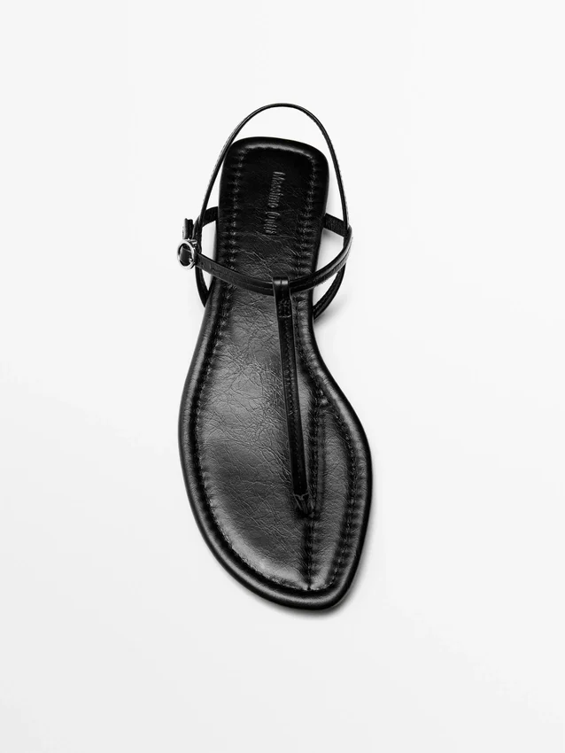 Flache Riemchensandalen mit Zehentrenner Flache Riemchensandalen mit Zehentrenner