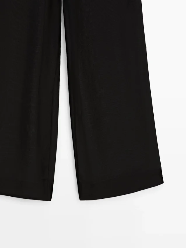 Fließende, kontrastierende Seidenhose Fließende, kontrastierende Seidenhose