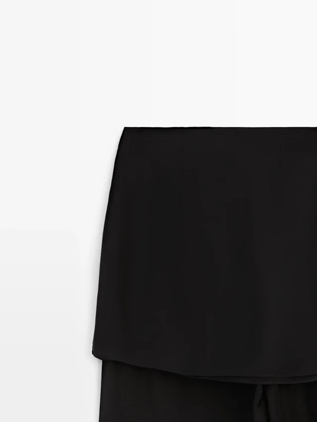 Fließende, kontrastierende Seidenhose Fließende, kontrastierende Seidenhose