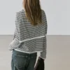 Gestreifter Strickpullover mit Ärmel-Detail Gestreifter Strickpullover mit Ärmel-Detail