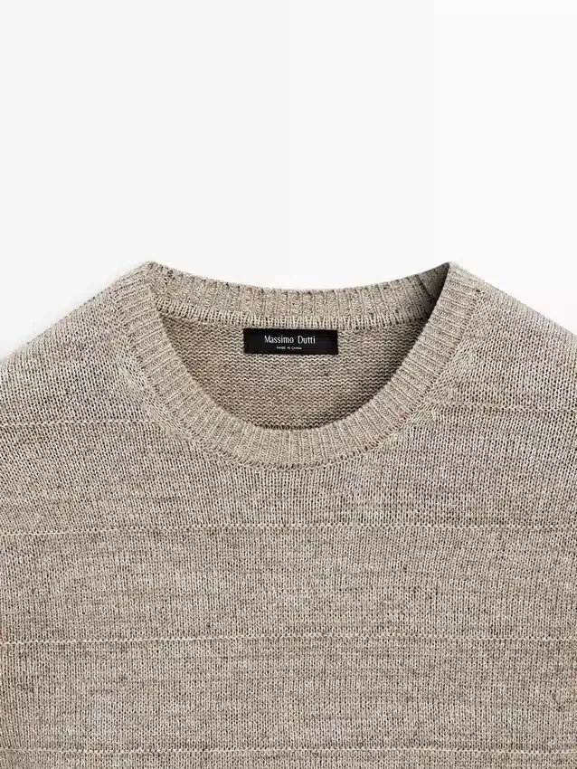 Gestreifter Strickpullover mit Rundhalsausschnitt Gestreifter Strickpullover mit Rundhalsausschnitt