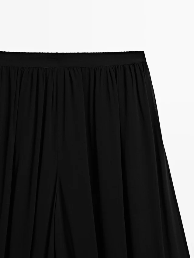 Halbtransparente Sarouel-Hose mit Knopfdetails Halbtransparente Sarouel-Hose mit Knopfdetails