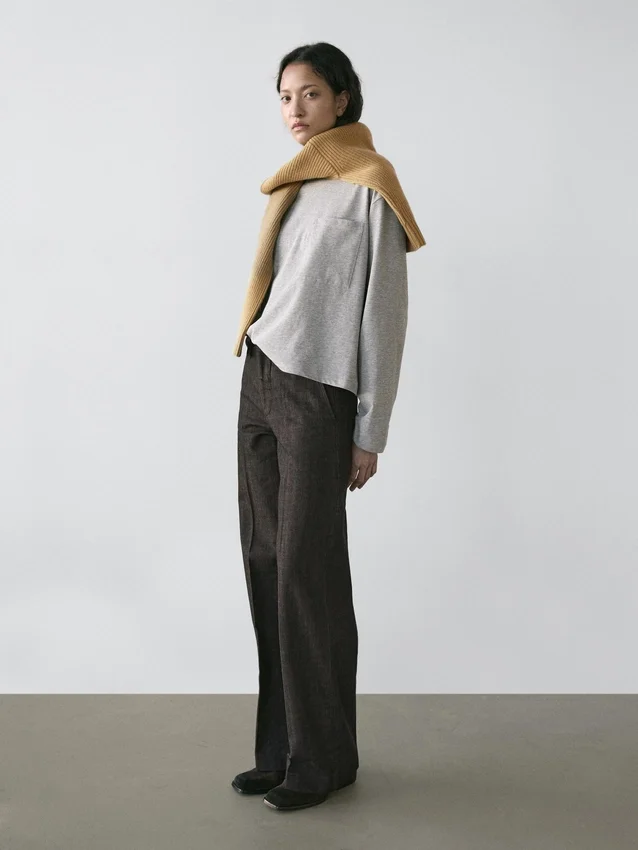 Jeans mit mittlerer Leibhöhe und weitem Bein Jeans mit mittlerer Leibhöhe und weitem Bein