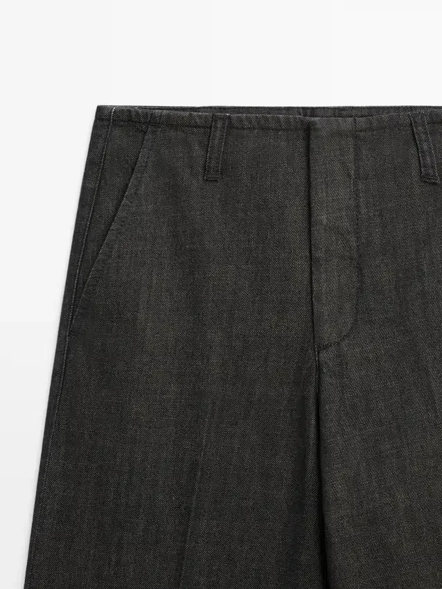 Jeans mit mittlerer Leibhöhe und weitem Bein Jeans mit mittlerer Leibhöhe und weitem Bein