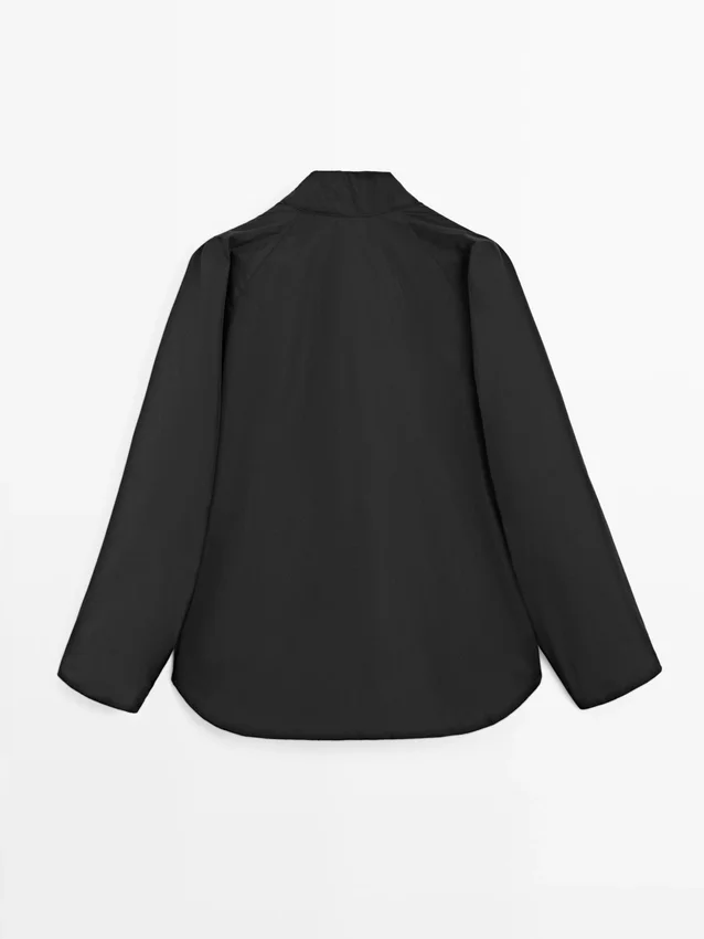 Kurzer, wattierter Parka mit Kragen Kurzer, wattierter Parka mit Kragen