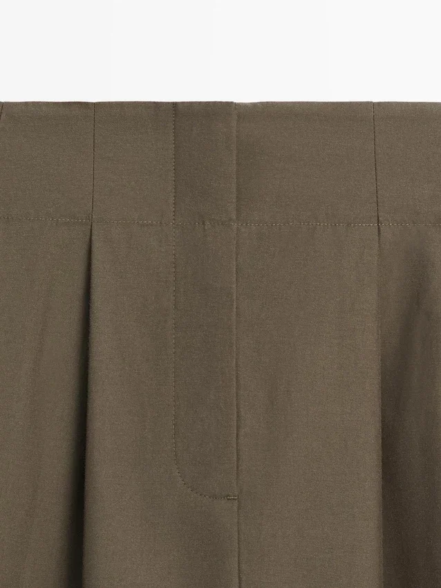 Midirock mit Kellerfalten Midirock mit Kellerfalten