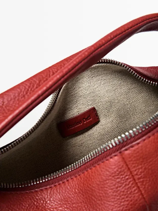 Mini-Halbmondtasche aus Nappaleder Mini-Halbmondtasche aus Nappaleder