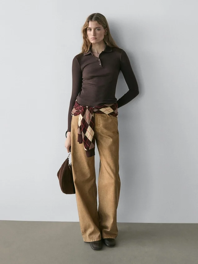 Poloshirt mit Schulterpolstern Poloshirt mit Schulterpolstern