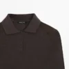 Poloshirt mit Schulterpolstern Poloshirt mit Schulterpolstern