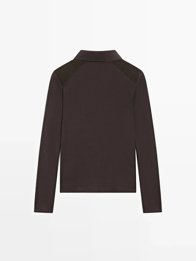 Poloshirt mit Schulterpolstern Poloshirt mit Schulterpolstern