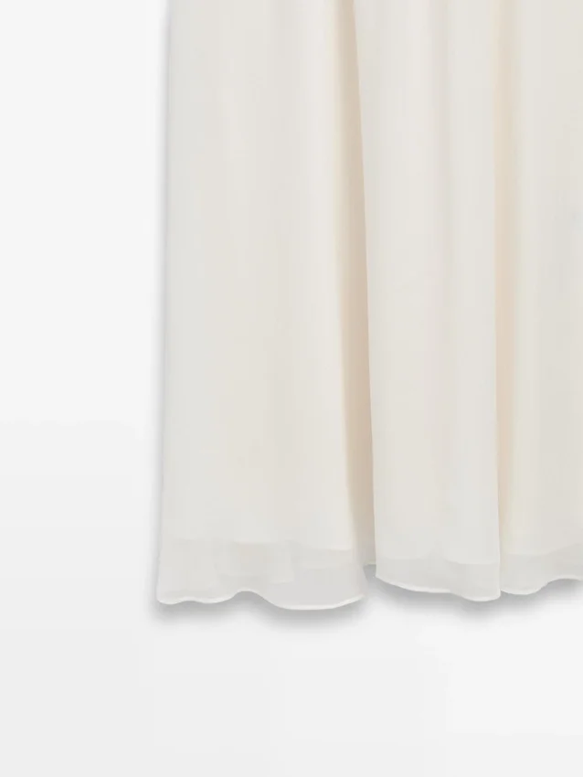 Strickkleid mit passenden Details Strickkleid mit passenden Details