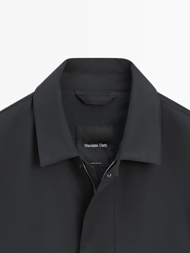 Trenchcoat aus wasserabweisendem Material Trenchcoat aus wasserabweisendem Material