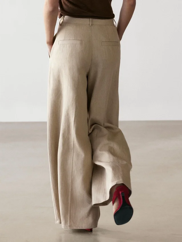 Weit geschnittene Hose mit hoher Taille Weit geschnittene Hose mit hoher Taille