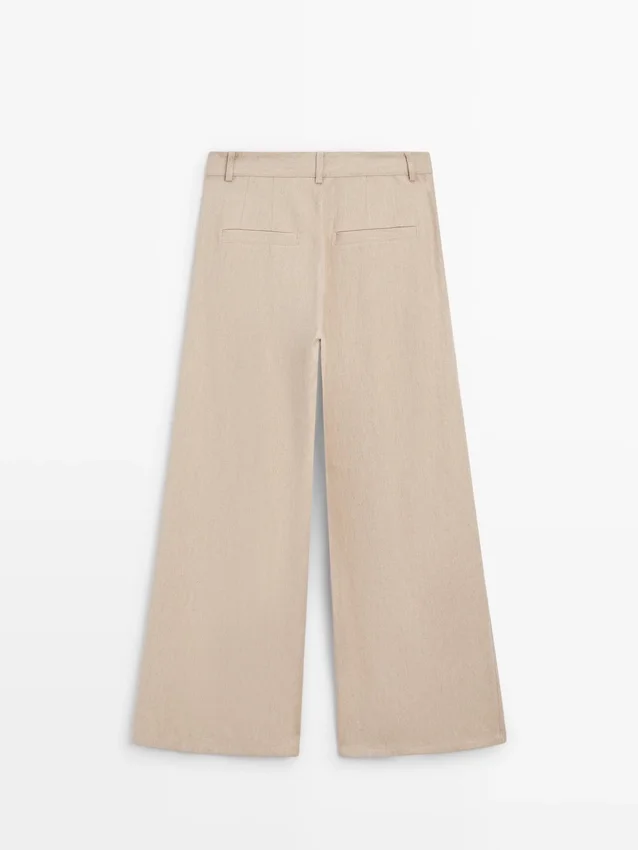 Weit geschnittene Hose mit hoher Taille Weit geschnittene Hose mit hoher Taille