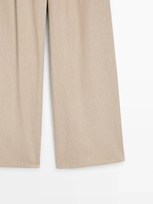 Weit geschnittene Hose mit hoher Taille Weit geschnittene Hose mit hoher Taille